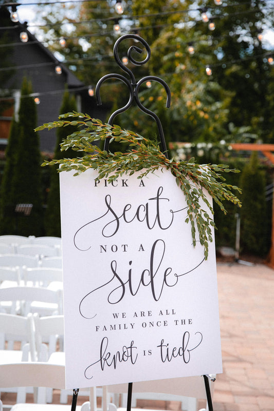 An elegant calligraphy 'Pick a Seat' wedding ceremony sign, an example of our affordable on-the-day stationery shipped Australia-wide.