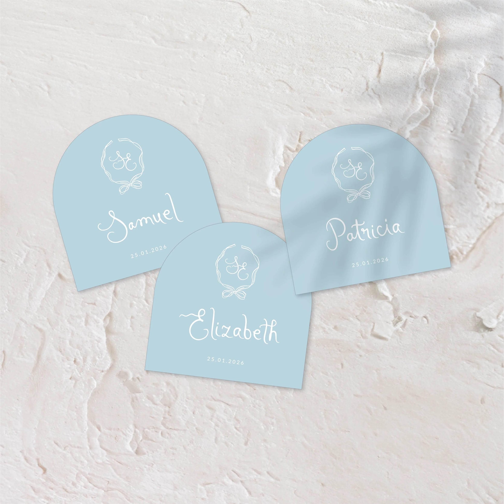 Custom-shaped blue acrylic coaster with elegant white script.