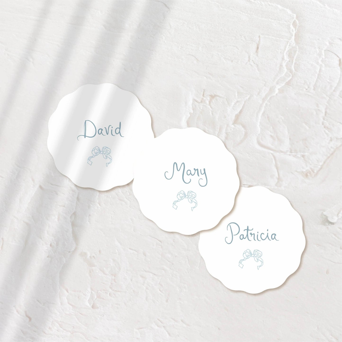 Sleek white round acrylic coaster with modern script.