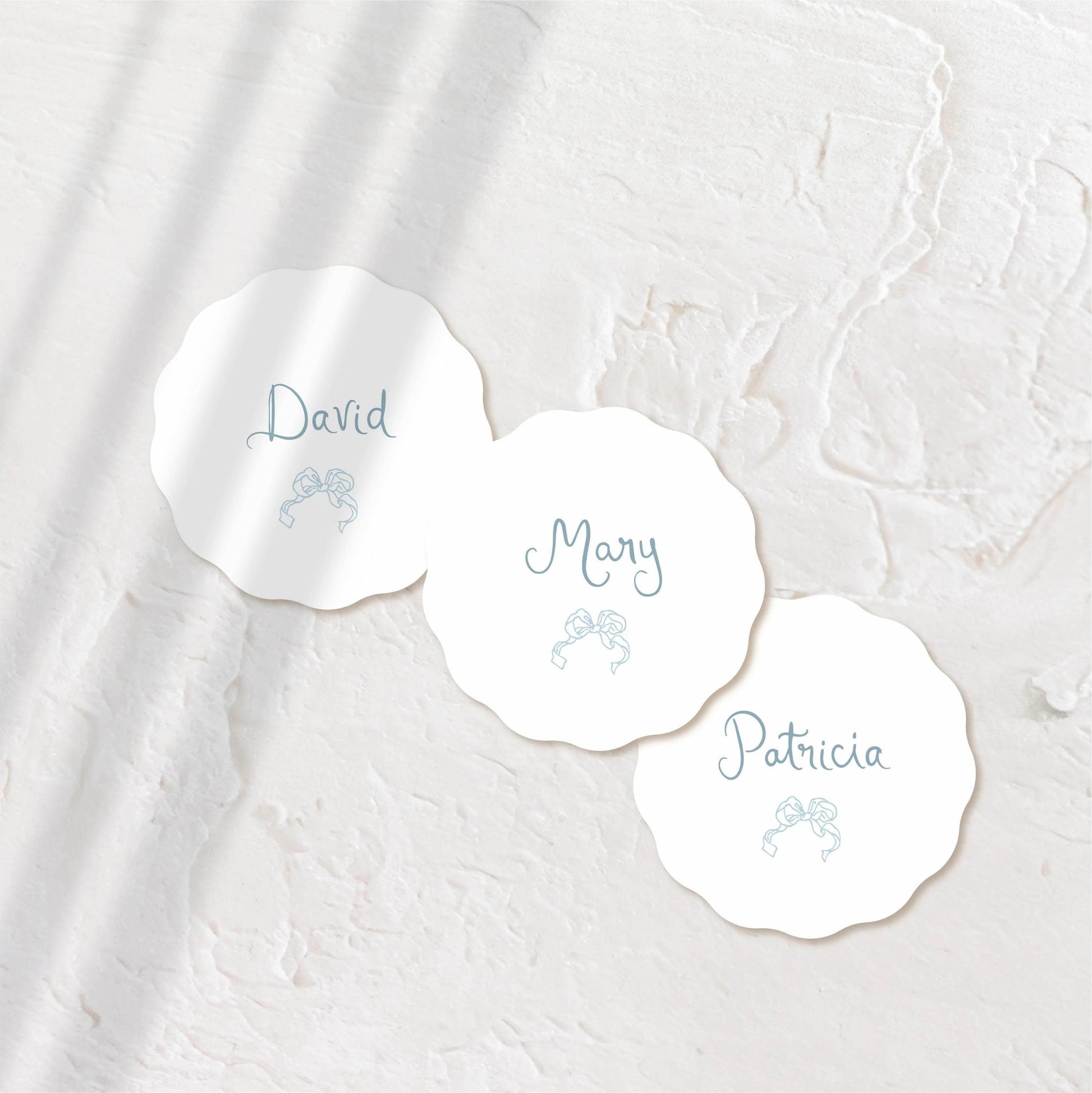 Sleek white round acrylic coaster with modern script.