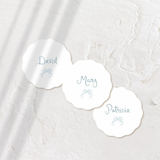 Sleek white round acrylic coaster with modern script.