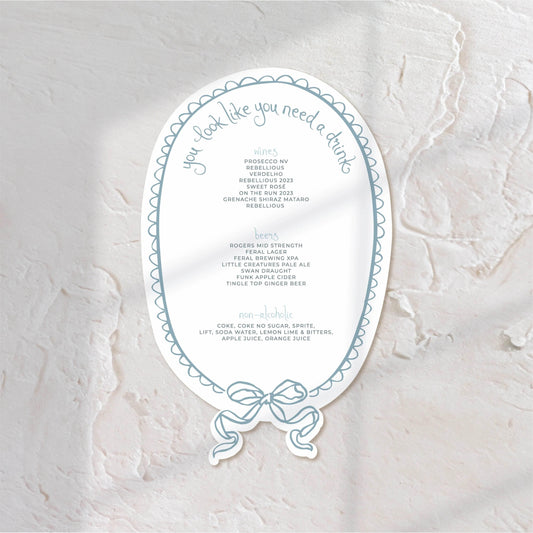 Oval-shaped bar menu with elegant blue accents