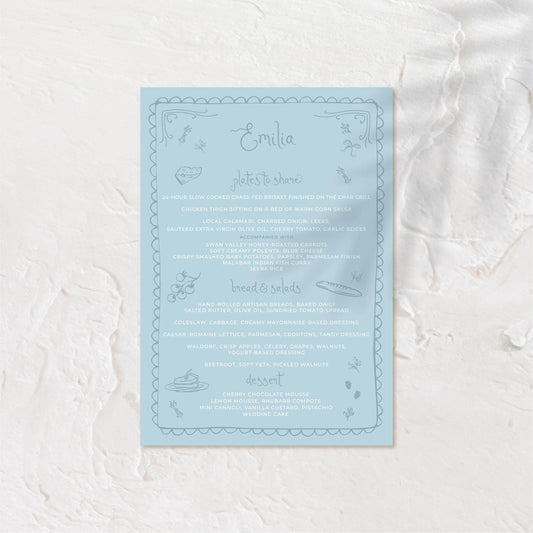 Bold blue wedding menu with modern typeface on a textured background.