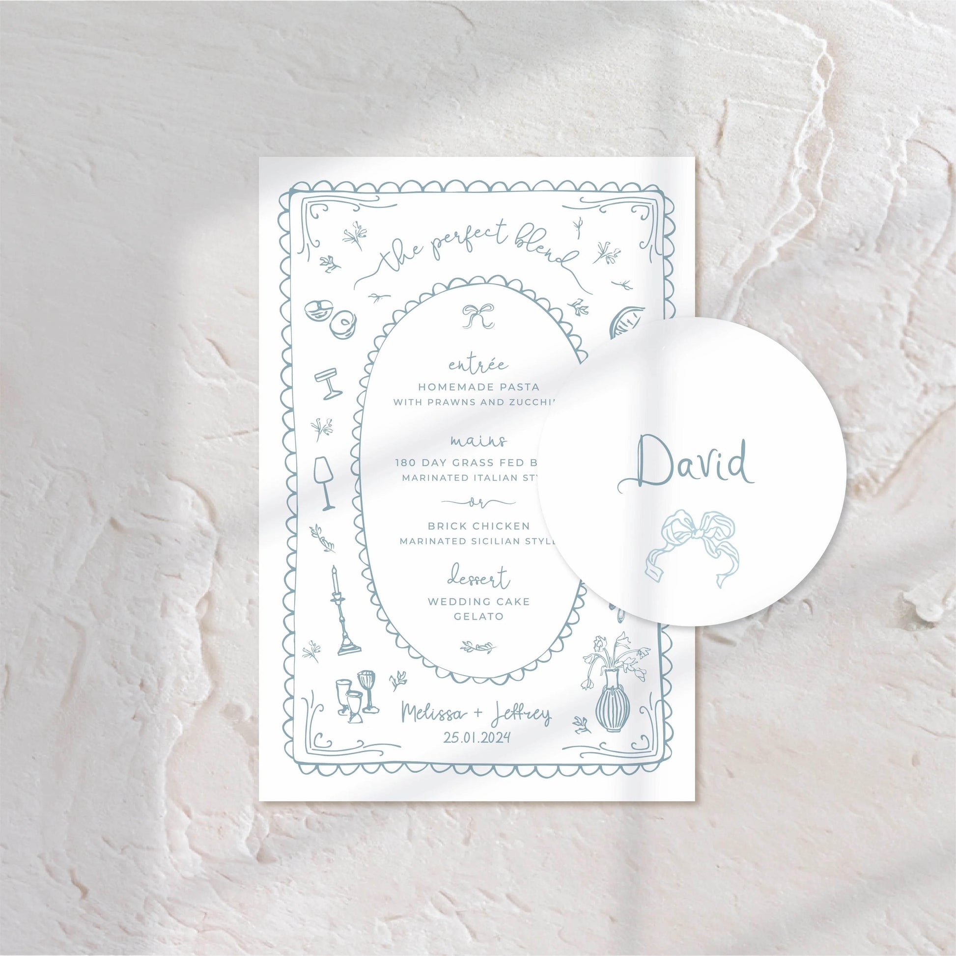 Delicate wedding menu and place cards with a refined, elegant design.