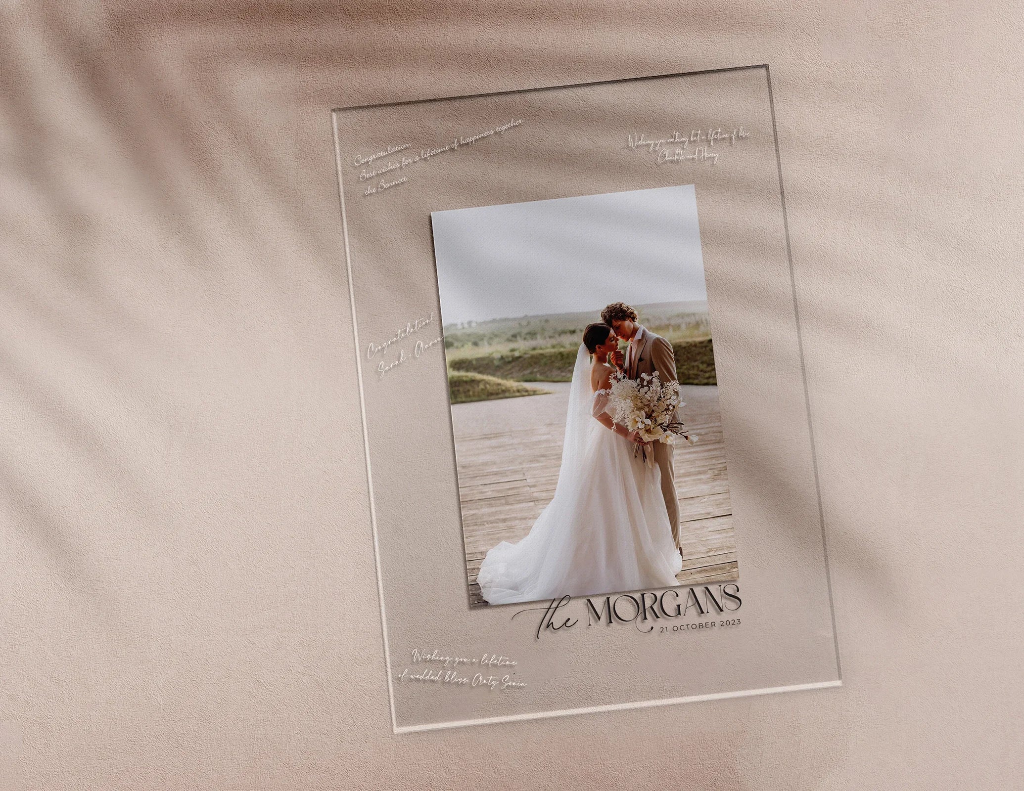 Acrylic wedding welcome sign with a photo of a newlywed couple, featuring personalised text 'The Morgans' and the wedding date '21 October 2023' in elegant typography.